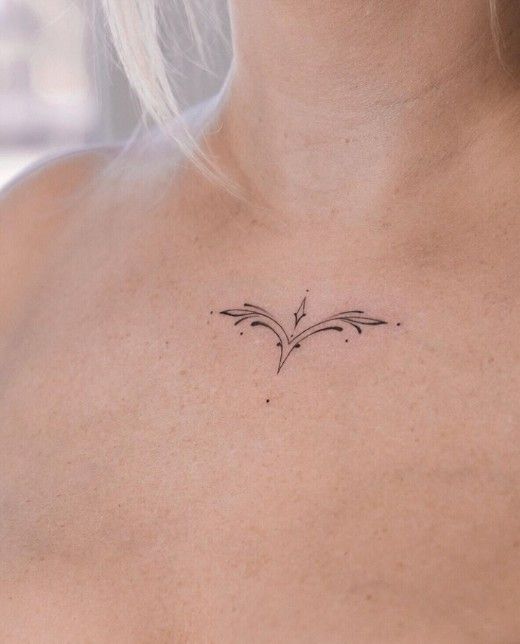 Hình xăm biểu tượng bạch dương nhỏ thanh lịch trên ngực hình xăm biểu tượng bạch dương mini tinh tế ở ngực