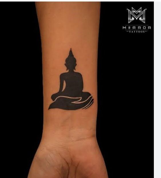 Phong cách xăm Phật hộ mệnh trên cánh tay kiểu tattoo hình phật hộ mệnh ở cẳng tay