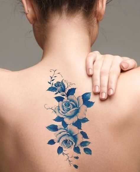 Hình xăm hoa xanh đẹp ở lưng Hình xăm hoa sau lưng xanh đẹp mắt
