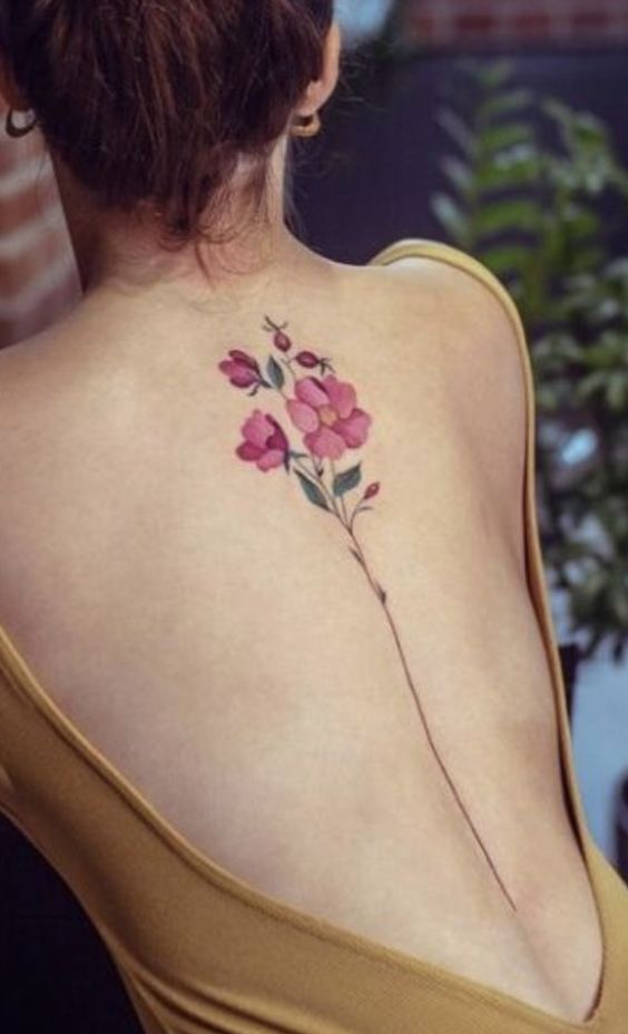 Hình xăm bông hoa đẹp ở lưng Tattoo hoa sau lưng kiêu sa