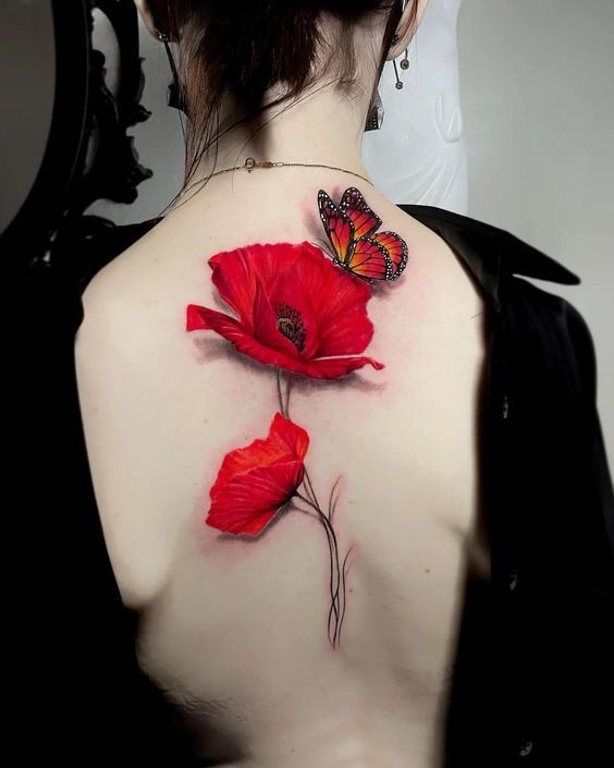 Hình xăm bông hoa đỏ tươi ở lưng Tattoo hoa sau lưng đỏ tươi