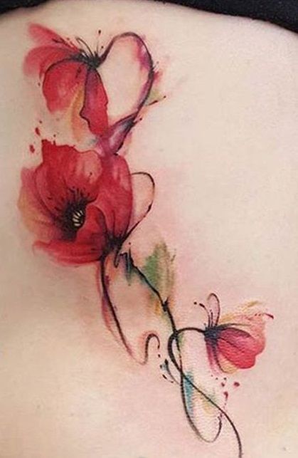 Hình xăm bông hoa đỏ tươi ở lưng Tattoo hoa sau lưng đỏ rực