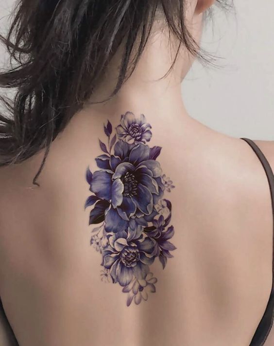 Hình xăm bông hoa đẹp và huyền bí ở lưng Hình xăm hoa sau lưng đẹp bí ẩn