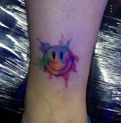 kiểu tattoo mặt cười với thái độ lạc quan