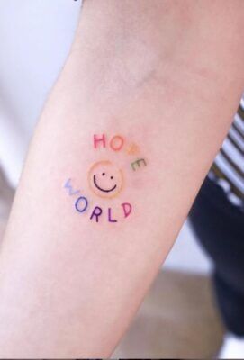 tattoo mặt cười biểu tượng niềm vui và lạc quan