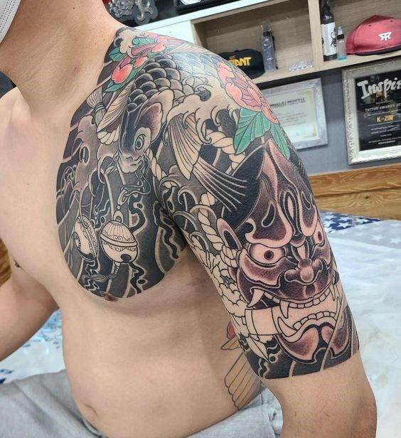 tattoo mặt quỷ kết hợp cá chép vắt vai cực chất