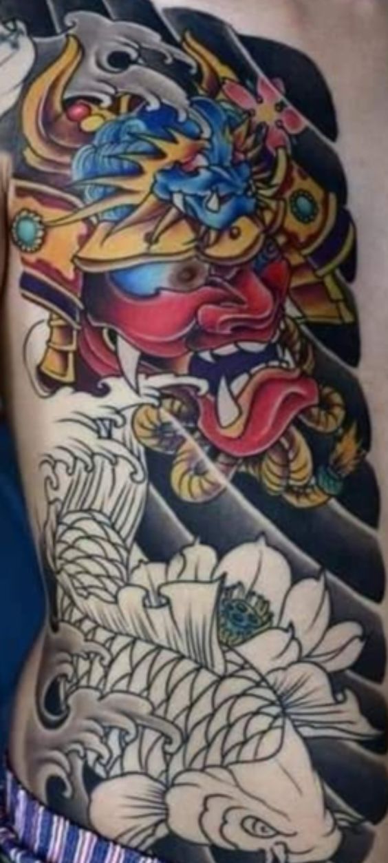 hoàn thiện tattoo cá chép kết hợp mặt quỷ nửa bụng