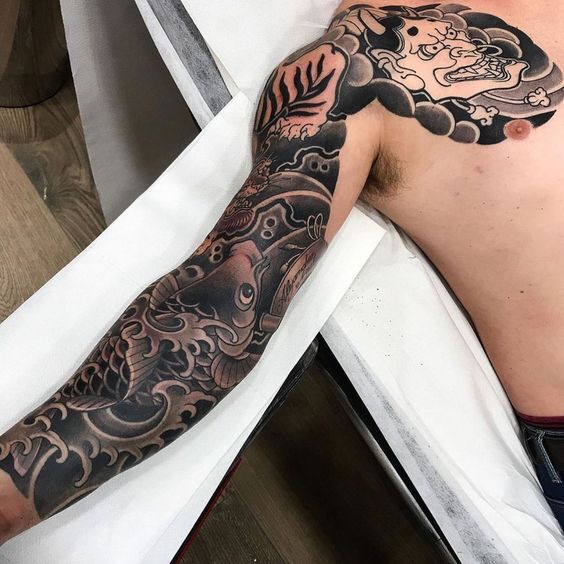 hoàn thiện hình xăm cá chép kết hợp họa tiết hổ và mặt quỷ