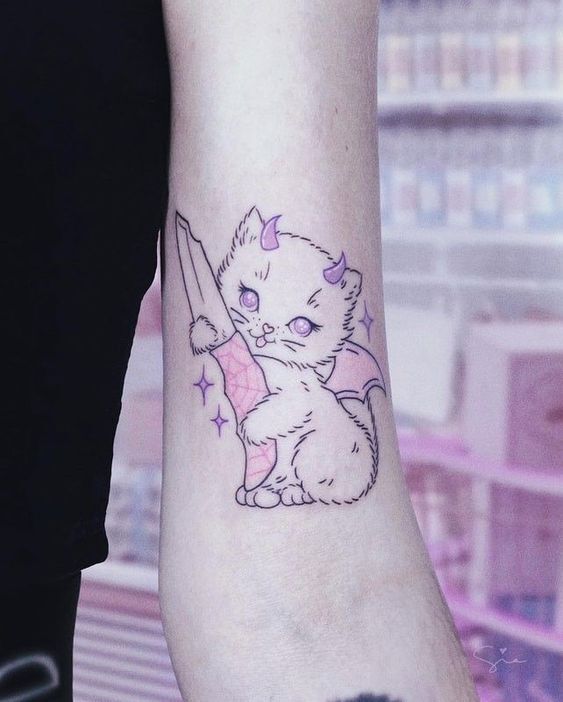 Thiết kế hình xăm mini mèo màu hồng dễ thương trên tay mẫu hình xăm mini ở cánh tay con mèo hồng cute