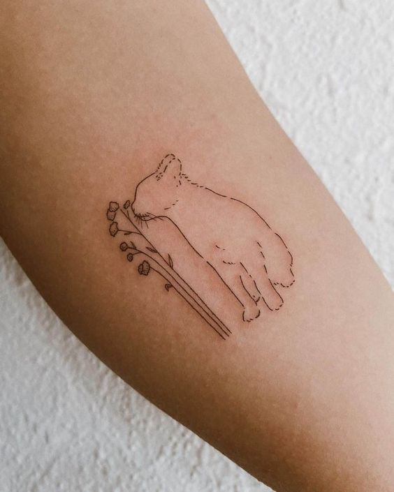 hình xăm trên cánh tay mèo và cành hoa tattoo ở cánh tay hình con mèo và cành hoa