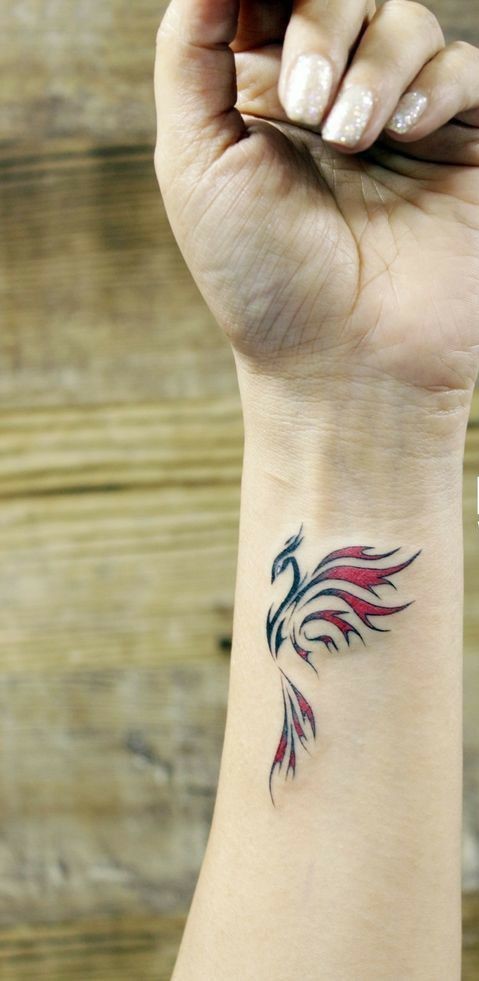 Hình xăm phượng lửa nhỏ trên cổ tay mẫu 4 hình xăm phượng hoàng lửa mini ở cổ tay mẫu 4