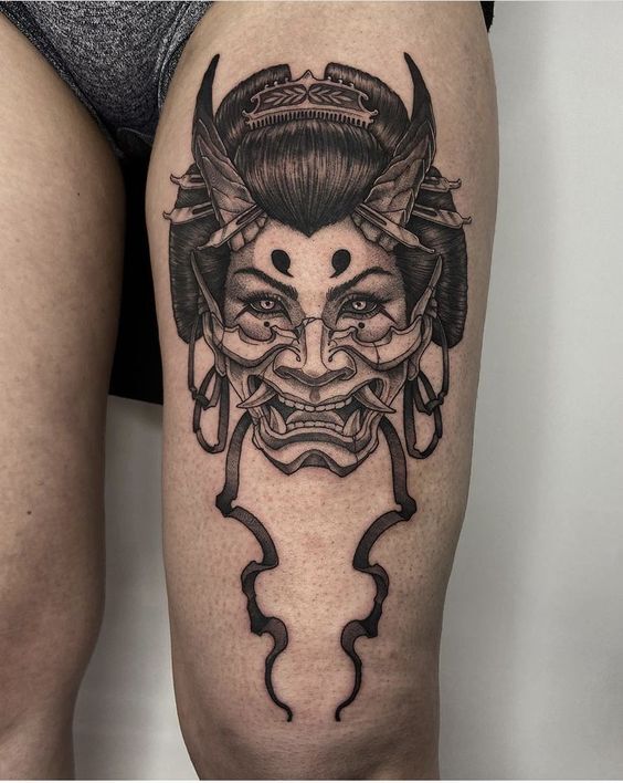 tattoo mini quỷ dạ xoa ở đùi đẹp