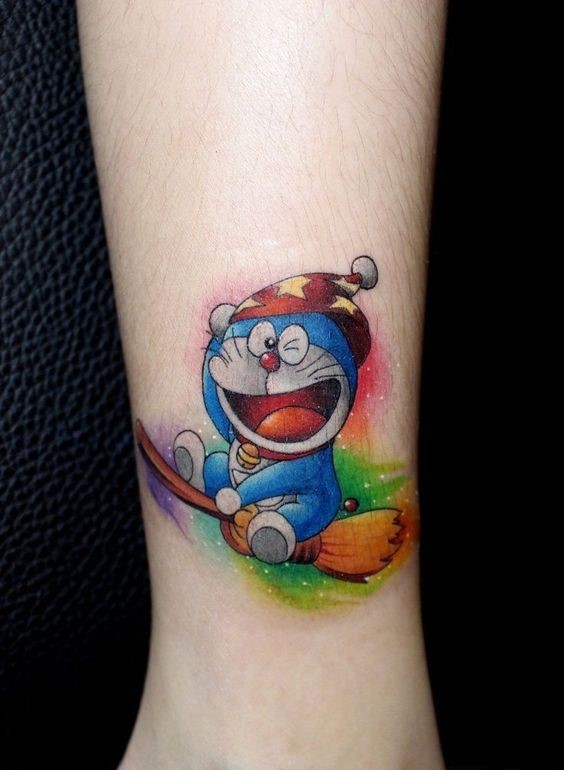 hình xăm doraemon cưỡi cây chổi hình xăm doraemon cưỡi cây chổi