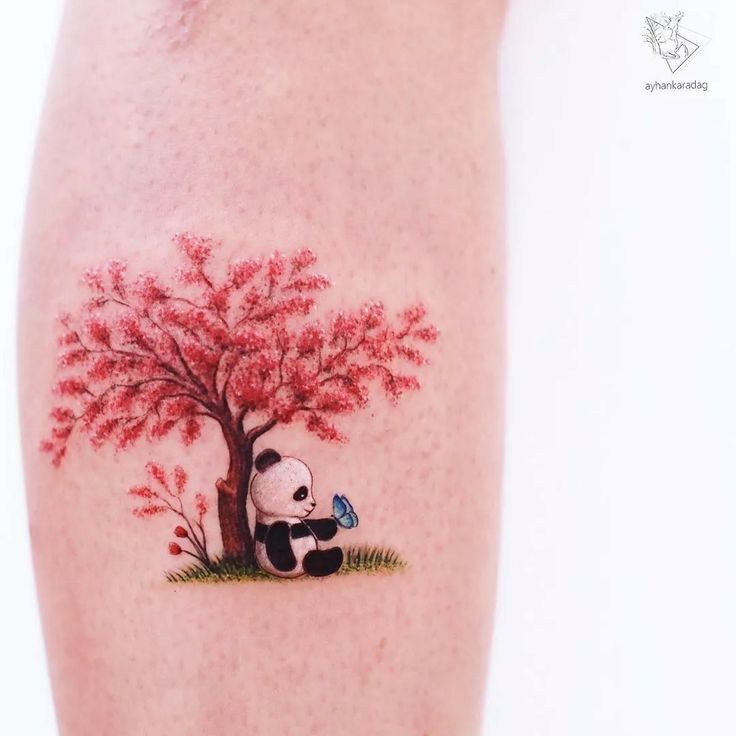 hình xăm gấu trúc nhỏ ngồi dưới cánh tay xăm gấu trúc mini ngồi dưới gốc tay