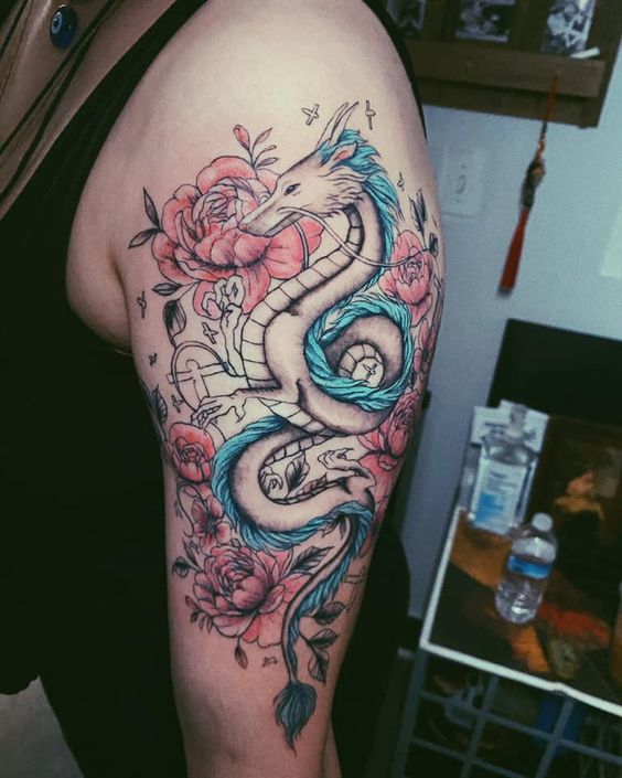 Hình xăm rồng Haku và hoa mẫu đơn trên bắp tay của khách hàng 200+ hình xăm rồng mang phong cách nhật cổ đến tả thực cực đẹp - Genztattoo