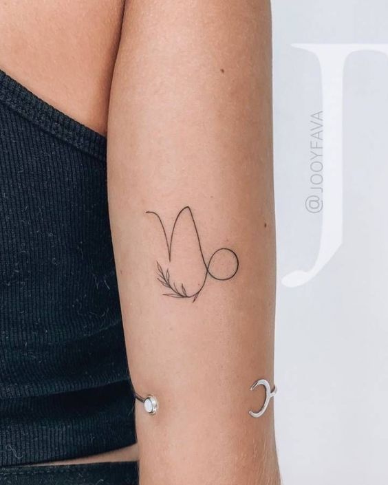 hình xăm biểu tượng lá ma kết đơn giản trên bắp tay 99 hình xăm cung ma kết đẹp và ý nghĩa mang phong thủy tốt - Genztattoo