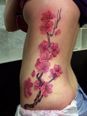 Cực kỳ bắt mắt với cành hoa đào bên hông Top 888+ hình xăm bên hông siêu cuốn hút - Genztattoo