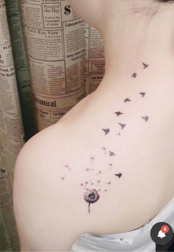 hình tattoo ở lưng nữ hoa bồ công anh