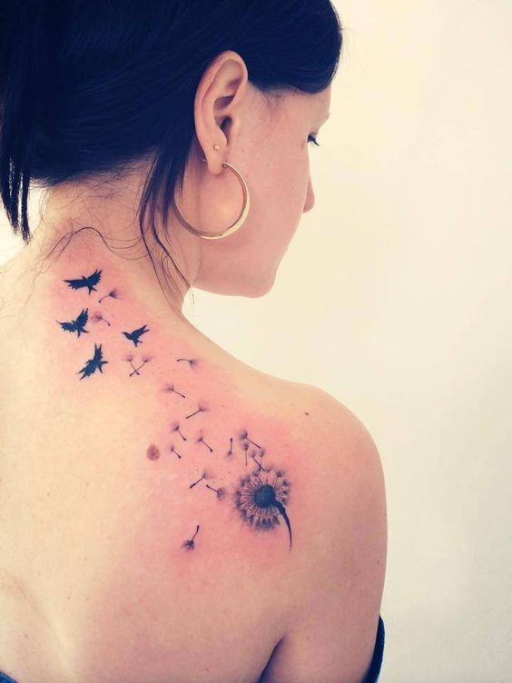 mẫu tattoo ở lưng hình bồ công anh cho nữ