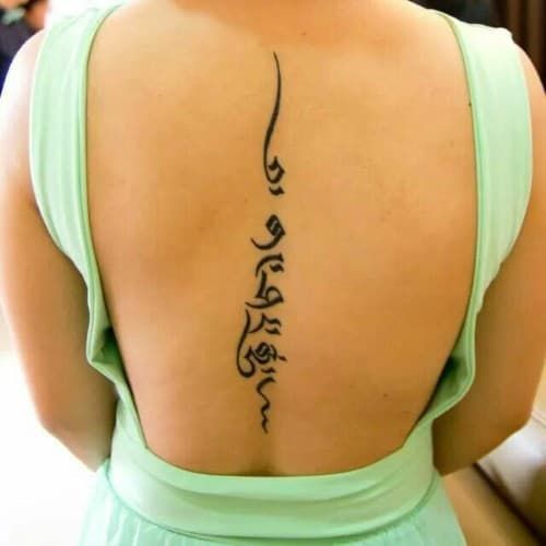 Hình xăm tiếng Phạn ý nghĩa ở lưng kiểu tattoo chữ phạn ý nghĩa ở lưng