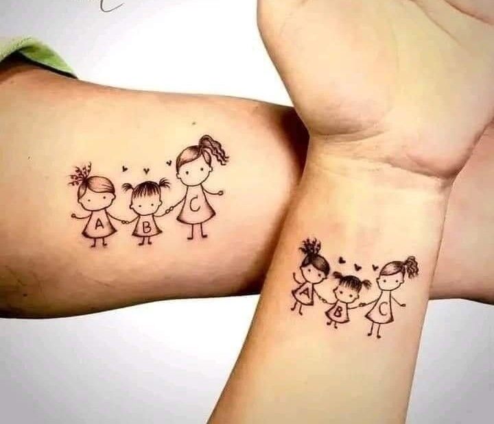 hình xăm ba đứa trẻ cho cặp đôi