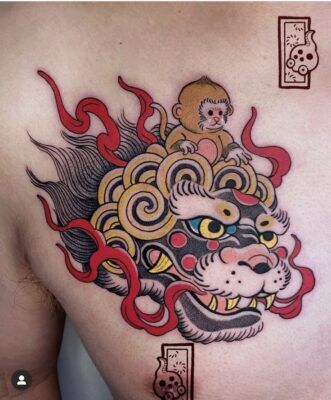 mẫu tattoo đầu lân cho nam trước ngực