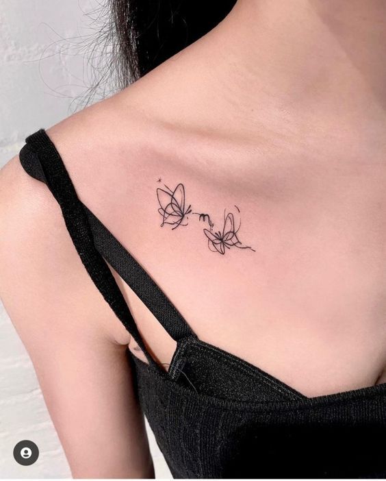 hình xăm độc đáo với hai biểu tượng của bọ cạp độc đao với mẫu tattoo kết hợp hai ký hiệu của cung bọ cạp