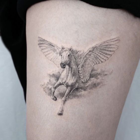 tattoo ngựa có cánh ở đùi chân thực