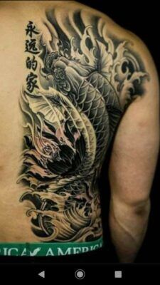 Hình xăm nghệ thuật nửa lưng với biểu tượng con cá biến thành rồng tattoo nửa lưng điệu nghệ với biểu tượng cá hóa rồng