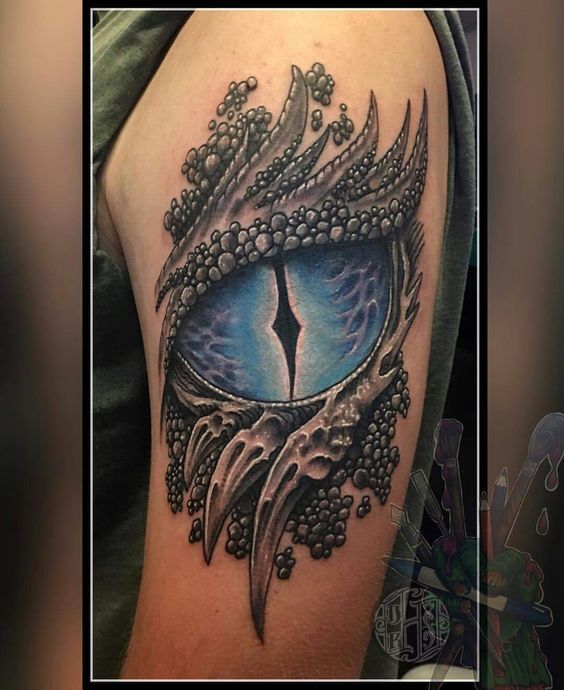 tattoo mắt rồng xanh ở bắp tay cực đẹp
