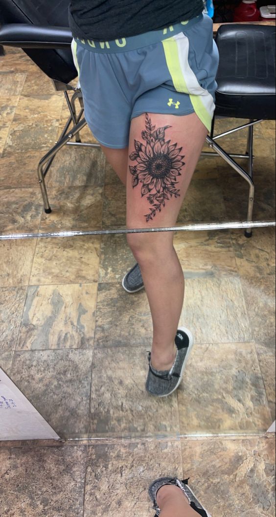 hình xăm hoa hướng dương ở đùi 333+ hình xăm hoa đẹp cho nữ nhẹ nhàng và tinh tế - Genztattoo
