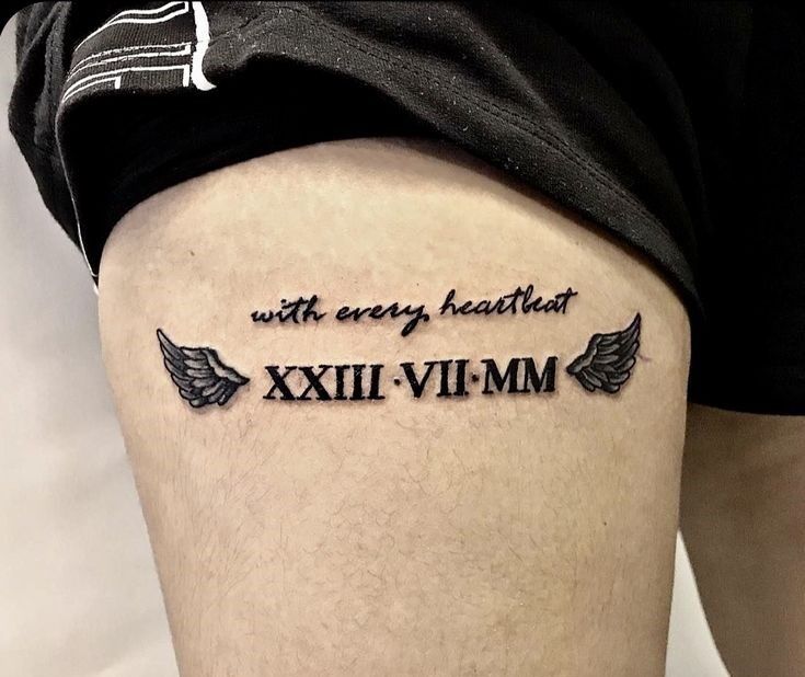 Hình xăm số La Mã ở đùi kiểu xăm chữ số la mã trên bắp đùi
