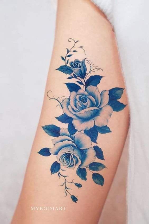 hình xăm hoa hồng xanh ở bắp tay nữ hình xăm hoa hồng xanh ở bắp tay nữ