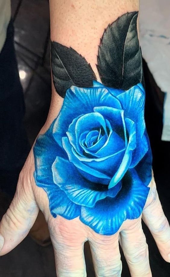 hình xăm hoa hồng xanh ở mu bàn tay mẫu tattoo bông hoa hồng xanh trên mu bàn tay