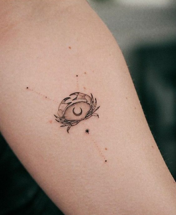 mẫu xăm con cua kèm bản đồ sao cung cự giải