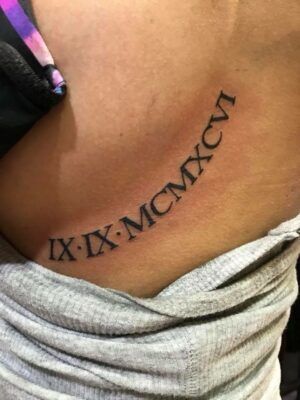 tattoo chữ số la mã dưới ngực tattoo chữ số la mã dưới ngực