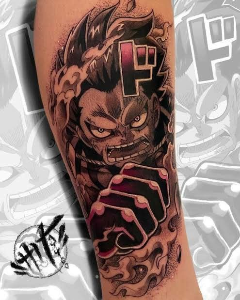 Hình xăm Luffy chiến đấu dữ dội trên bắp tay Tổng hợp 777+ hình xăm luffy độc đáo và ấn tượng nhất - Genztattoo