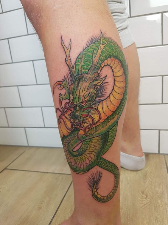 hình xăm rồng shenron ở chân dưới 99 mẫu hình xăm rồng xanh đẹp nhất cho anh em đam mê