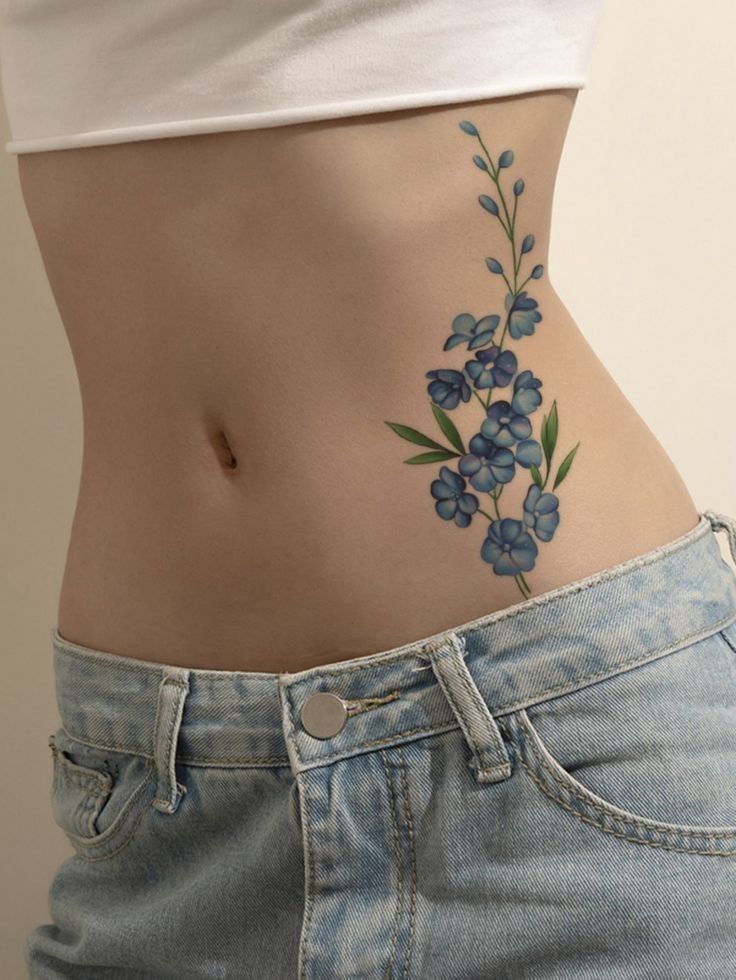 mẫu xăm eo mang màu sắc hiện đại mẫu xăm eo mang màu sắc hiện đại