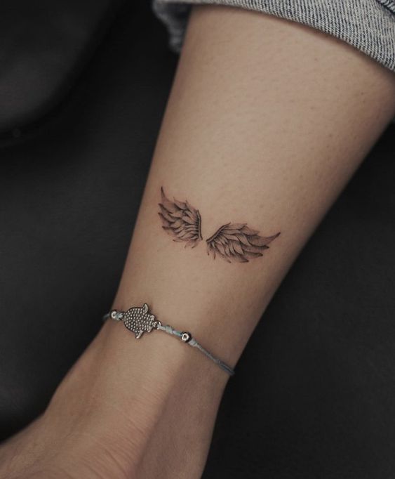hình xăm đôi cánh thiên thần mini đẹp ở gót chân hình xăm đôi cánh thiên thần mini đẹp ở gót chân