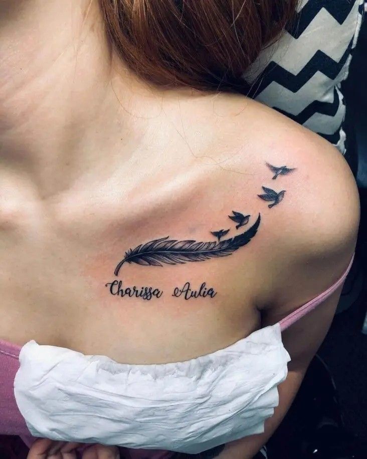 mẫu tattoo lông vũ dọc xương quai xanh mẫu tattoo lông vũ dọc xương quai xanh