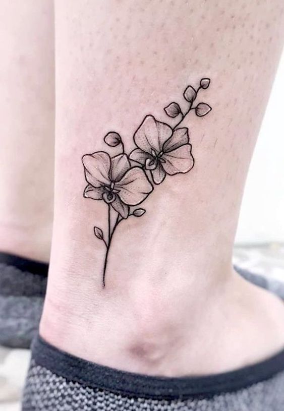 tattoo hoa lan nhỏ trên cổ chân tattoo hoa lan nhỏ trên cổ chân