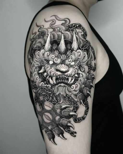hình xăm kì lân ba sừng ở bắp tay hình xăm kì lân ba sừng ở bắp tay
