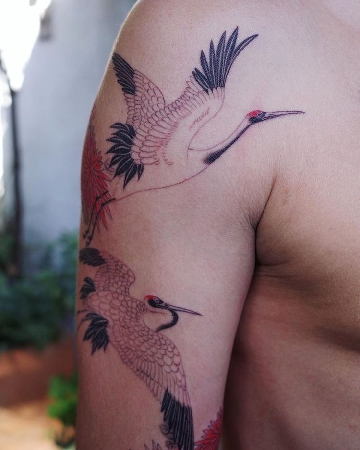 tattoo đôi hạc đang bay ở tay tattoo đôi hạc đang bay ở tay