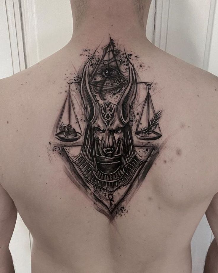 hình xăm anubis đang cân tim hình xăm anubis đang cân tim