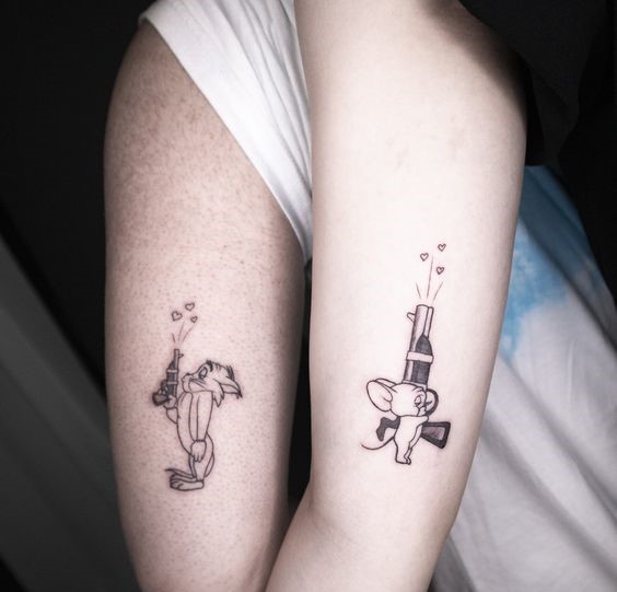 hình xăm cặp đôi hoạt hình trên cánh tay Top 600+ hình xăm couple siêu ngầu và cá tính - Genztattoo