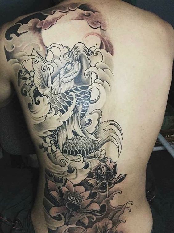 hình xăm cá chép ngược nước kết hợp hoa sen đơn sắc hình xăm cá chép ngược nước kết hợp hoa sen đơn sắc